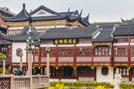 SHANGHAI, CHINA, DECEMBER - 2018 - Small pond and surrounded by traditional building at yuyan garden, shanghai city, chinaのeditorial素材