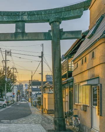 MATSUMOTO, JAPAN, JANUARY - 2019 - Traditional shinto tori gate at urban neighborhood, matsumoto, japanのeditorial素材