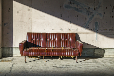 MATSUMOTO, JAPAN, JANUARY - 2019 - Leather armchair abandoned at street in matsumoto city, japanのeditorial素材