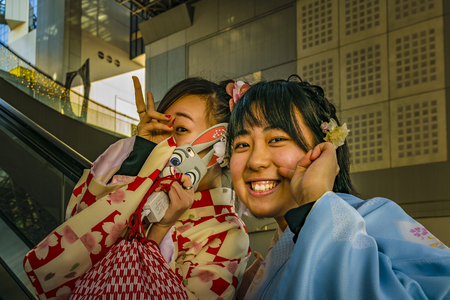 KYOTO, JAPAN, JANUARY - 2019 - Japanese teens with geisha cosutme smiling for a photo, Kyoto, Japanのeditorial素材