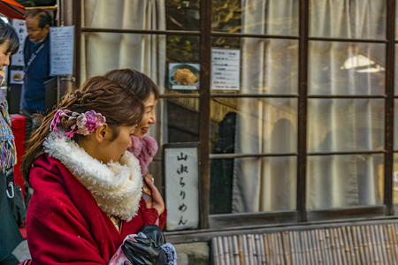 KYOTO, JAPAN, JANUARY - 2019 - Young japanese women dressing traditional geisha costume at kyoto street, japanのeditorial素材