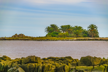 MONTEVIDEO, URUGUAY, MAY - 2019 - Seascape scene with small island as main subject, montevideo, uruguayのeditorial素材