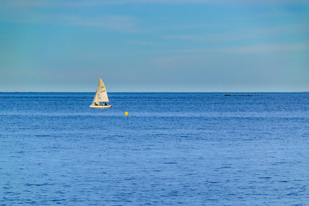 MONTEVIDEO, URUGUAY, MAY - 2019 - Sailboat sailing at river in montevideo coast, uruguayのeditorial素材