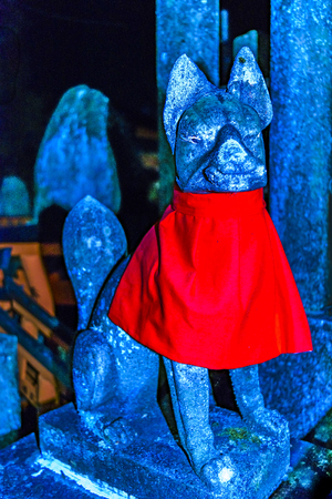 KYOTO, JAPAN, JANUARY - 2019 - Fox or dog sculpture at famous fushimi inari taisha in kyoto, japanのeditorial素材