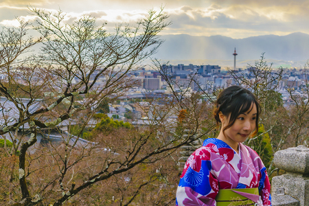KYOTO, JAPAN, JANUARY - 2019 - Young asian woman with traditional geisha costume posing for a photo, kyoto, japanのeditorial素材