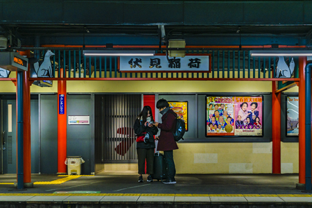 KYOTO, JAPAN, JANUARY - 2019 - Young couple at train line station, kyoto city, japanのeditorial素材
