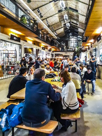 MONTEVIDEO, URUGUAY, AUGUST - 2019 - Interior scene of crowded food court building, montevideo city, uruguayのeditorial素材