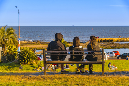 MONTEVIDEO, URUGUAY, OCTOBER - 2019 - People enjoying a nice spring day at waterfront park in buceo neighborhood, montevideo, uruguayのeditorial素材