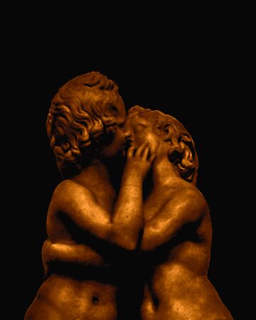 Orange and black high contrast famous eros and psyche kissing sculpture artの写真素材