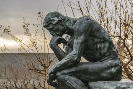 Side view of bronze thinker sculpture located at western art national museum of tokyo, japan