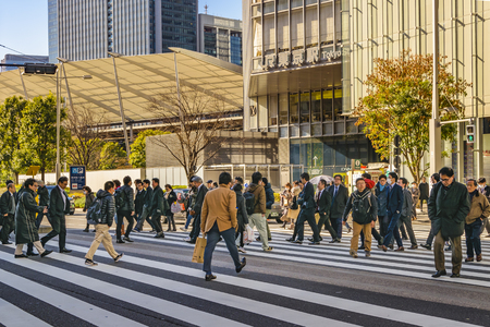 TOKYO, JAPAN, JANUARY - 2019 - Urban day scene with people crossing the street at ginza district, tokyo, japanのeditorial素材