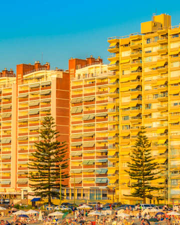 PUNTA DEL ESTE, URUGUAY, FEBRUARY - 2020 -  Summer scene at crowded mansa beach in punta del este city, Uruguayのeditorial素材
