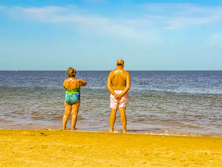 Senior couple watching the sea at mansa beach in punta del este city, Uruguayのeditorial素材