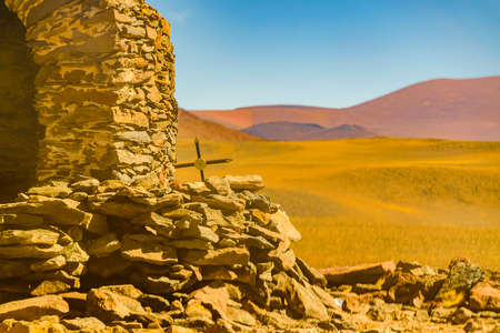 Exterior view of stone shelter building at arid landscape, la rioja province, argentinaの写真素材