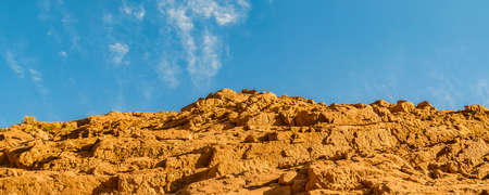 Low angle dry mud rocky hill, brava lagoon reserve, la rioja province, argentina
