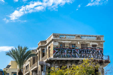 Low angle distant shot old style abandoned buildings, tel aviv, israelの写真素材