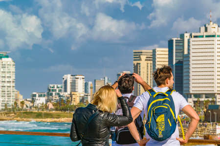 TEL AVIV, ISRAEL, DECEMBER - 2019 - Sunny day scene young tourists at viewpoint, tel aviv, israelのeditorial素材