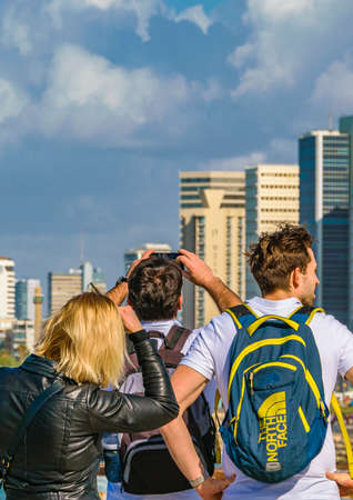 TEL AVIV, ISRAEL, DECEMBER - 2019 - Sunny day scene young tourists at viewpoint, tel aviv, israelのeditorial素材