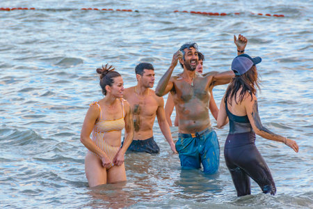 JERUSALEM, ISRAEL, DECEMBER - 2019 - People enjoying famous dead sea kalia beach, israelのeditorial素材