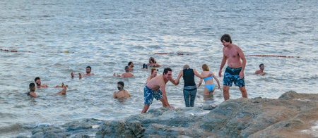 JERUSALEM, ISRAEL, DECEMBER - 2019 - People enjoying famous dead sea kalia beach, israelのeditorial素材