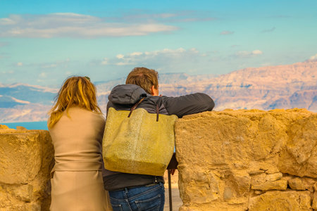 Young couple watching the view at Masada fortress, Judea, Israelのeditorial素材