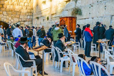 JERUSALEM, ISRAEL, DECEMBER - 2019 - Crowd praying at famous wailing wall, old jerusalem cityのeditorial素材