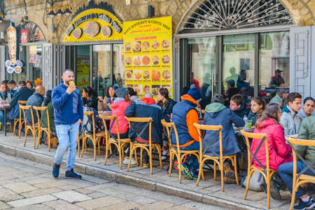 JERUSALEM, ISRAEL, DECEMBER - 2019 - Crowded restaurant, old city of jersualemのeditorial素材