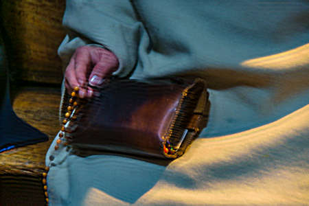 Man holding bible, holy sepulcher church, old jerusalem city