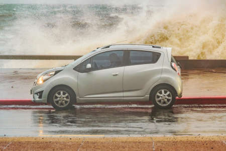 Stormy urban coastal scene at boardwalk avenue, montevideo, uruguayの写真素材