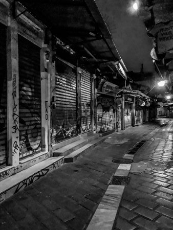ATHENS, GREECE, JANUARY - 2020 - Empty urban night scene at monastiraki flea market.のeditorial素材