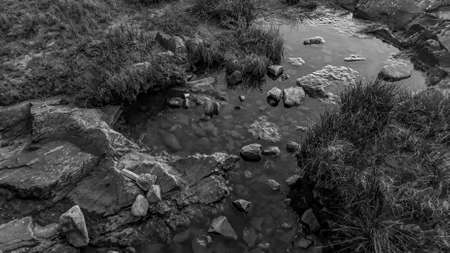 Black and white rock coastal detail scene, montevideo, uruguay