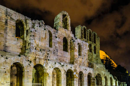 Night scene at famous herodes theater, athens city, greeceの写真素材
