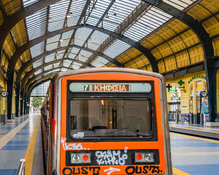 PIRAEUS, GREECE, JANUARY - 2020 - Train arriving at station, piraeus town, athens, greeceのeditorial素材