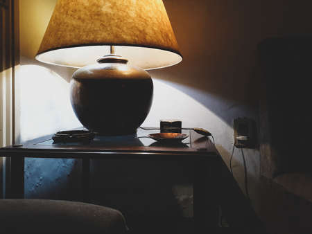 High contrast dark scene living room detail.の写真素材