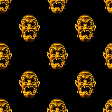 Conversational seamless pattern design golden macabre mask motif in gold and black colorsの写真素材