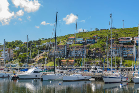 PIRIAPOLIS, URUGUAY, MARCH - 2022 - Sunny summer day scene at piriapolis city port, maldonado, uruguayのeditorial素材