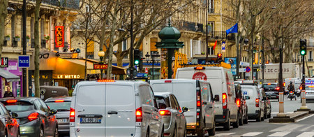 PARIS, FRANCE, JANUARY - 2020 - Urban day scene at avenue of historic center of paris, france