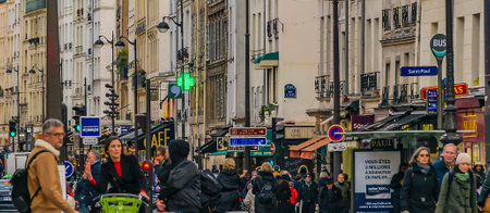 PARIS, FRANCE, JANUARY - 2020 - Crowded urban day street scene at historic center of paris, franceのeditorial素材