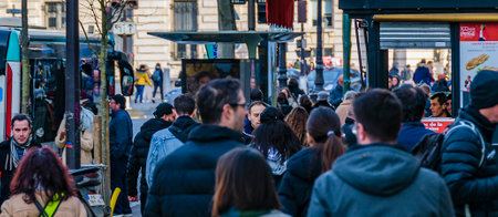 PARIS, FRANCE, JANUARY - 2020 - Long shot urban scene crowd walking at street of paris, franceのeditorial素材