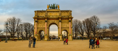 PARIS, FRANCE, JANUARY - 2020 - Crowd walking at famous tuileries garden, paris city, france