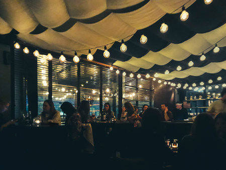 MONTEVIDEO, URUGUAY, SEPTEMBER - 2021 - People at interior of pub, punta carretas, montevideo, uruguayのeditorial素材