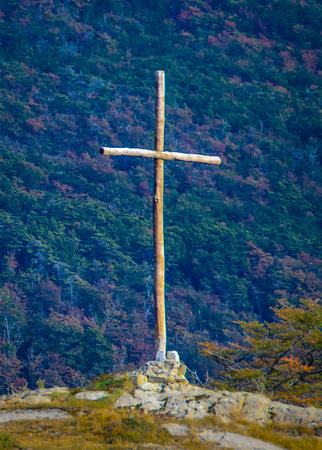 Wooden cross at top of hill, Tierra del Fuego National Park, Argentinaの写真素材