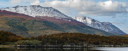 Snowy mountains at background of Lapataia river at Tierra del Fuego park, Argentina
