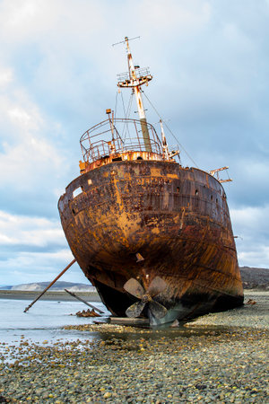 Abandoned aground commercial ship at Cabo San Pablo beach, Tierra del Fuego, Argentinaの写真素材