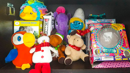 Samborondon, Ecuador; August 22 2022: Mix of kids toys organized in black color stand wardrobeのeditorial素材