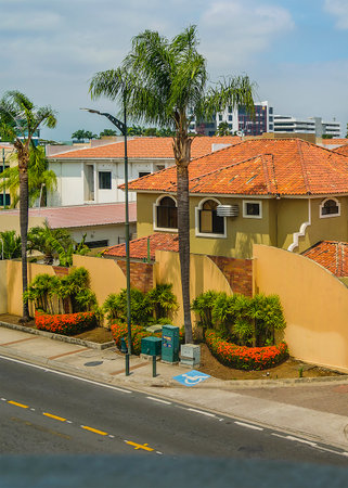 Samborondon, Ecuador; August 10 2022: Exterior shot of high class neighborhood residential homes at Samborondon district, Guayas province, Ecuadorのeditorial素材