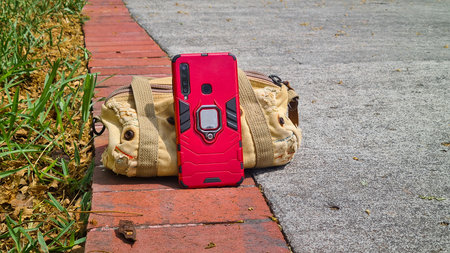 Smartphone at park ground ready to timer selfie, Guayaquil, Ecuador