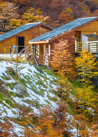 Rustic wooden park ranger houses at martial glacier, ushuaia, Tierra del Fuego, Argentinaの写真素材
