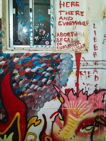 Montevideo, Uruguay; September 18 2022: Pub bathroom painted with urban artの写真素材