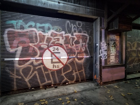 Night scene car exterior garage with graffiti, Montevideo city, Uruguayの写真素材